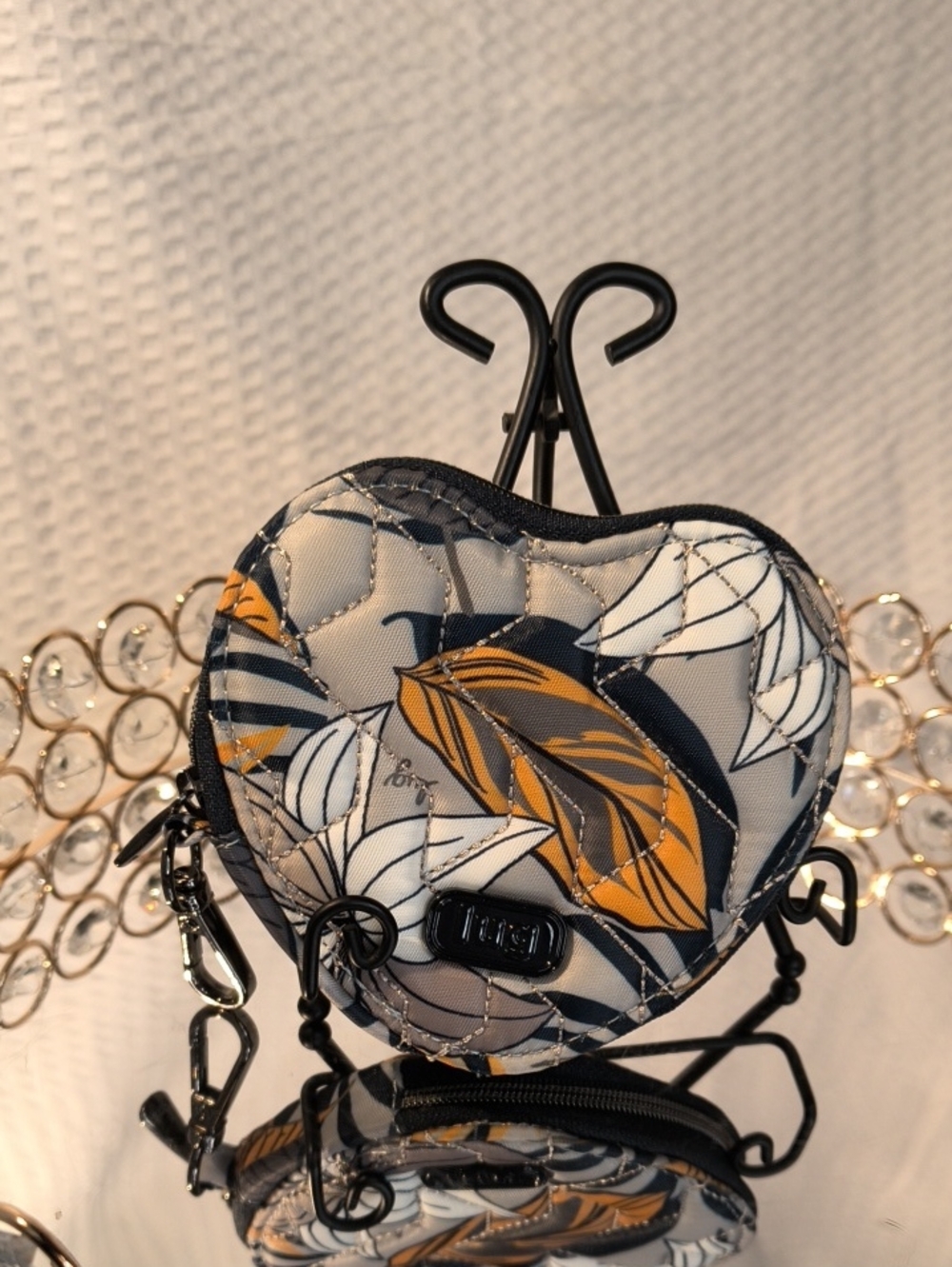 Lug Heart Pouch in the Lily Grey tropical leaf pattern